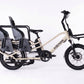 Roxform PORTO S electric longtail cargo bike in Cream, side view, fitted with the Family Pack caboose and two Urban Iki TA-KE child seats [addon:family-pack-caboose-footrest-without-cushion] [addon:rear-seat-ta-ke-carrier-mount-icho-green-bincho-black|2]
